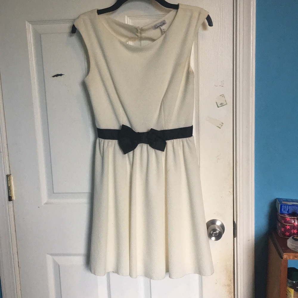 White dress with black bow